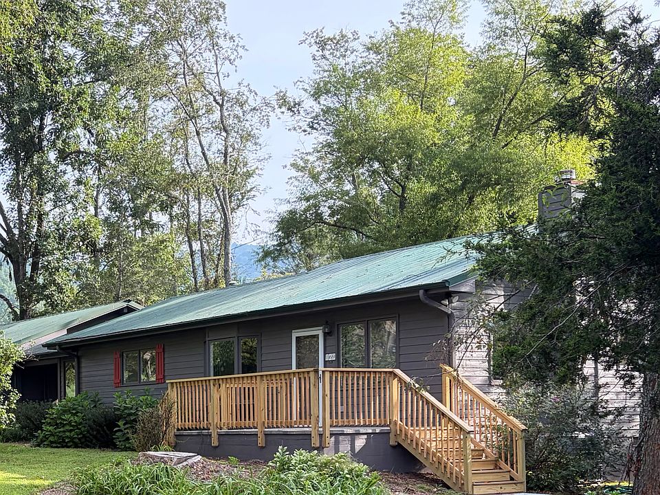 Front of house with deck.