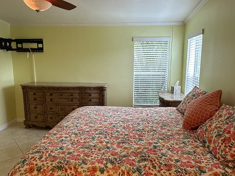 Master bedroom (Note: all bedrooms have large ceiling fans and TV sets!) View #2