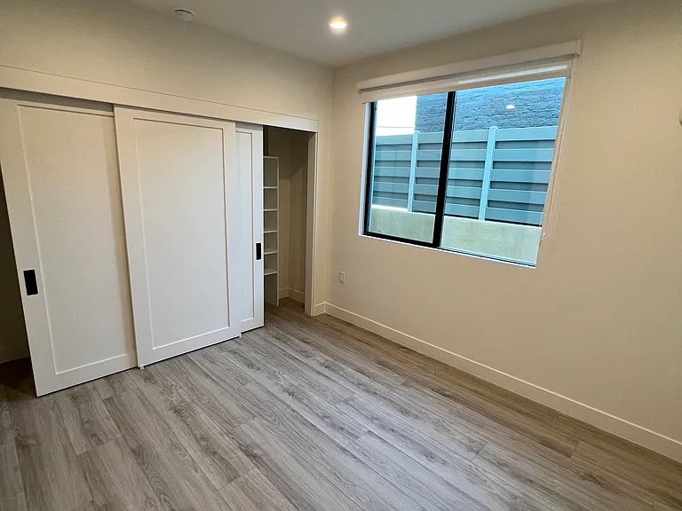 Bedrooms with windows and double closets