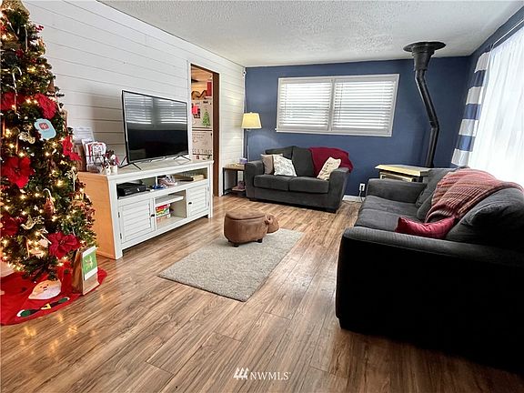 Living room is updated to be bright and charming