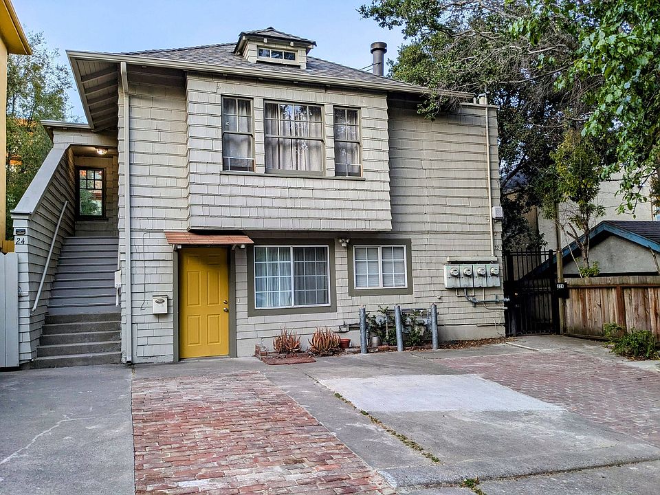 Triplex exterior - entrance to 3-BR apartment located upstairs