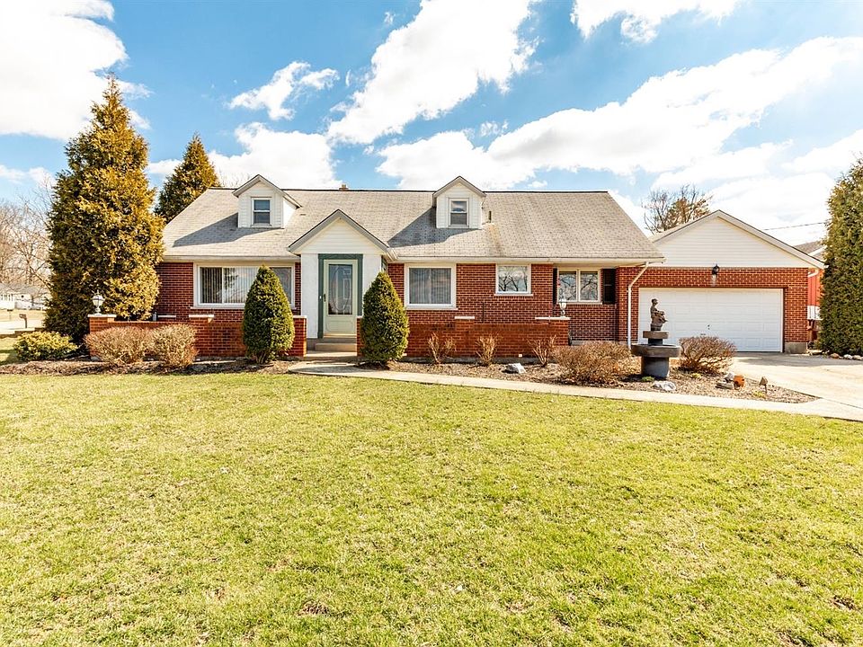 Custom built home in 1957 and has been continually updated through the years. Three bedrooms - one on the main level and two on the upper level. Optional fourth bedroom on lower level.