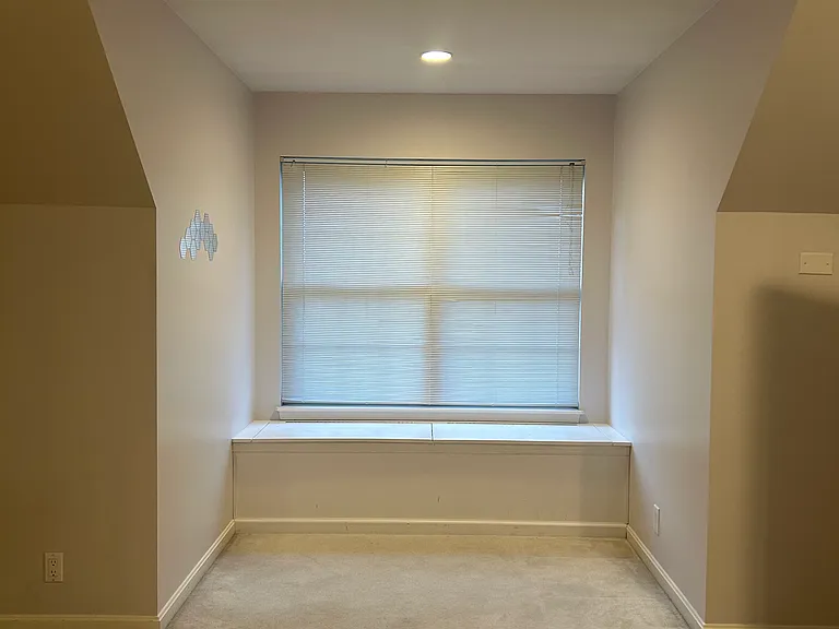 In same oversized room. Has a toy / Storage chest and gorgeous view of the back yard.