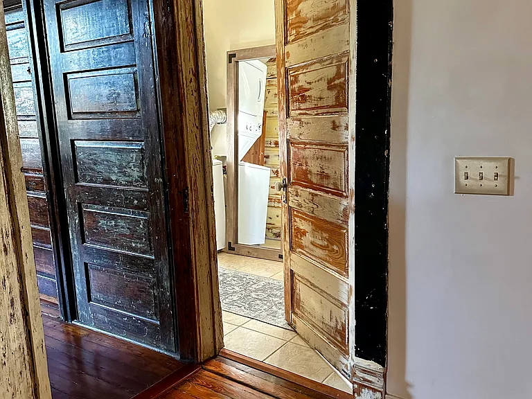 Full Bath and Laundry Room right off the living room and connects to the Master Suite