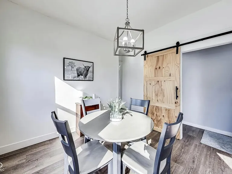 dining room / half bath - staged
