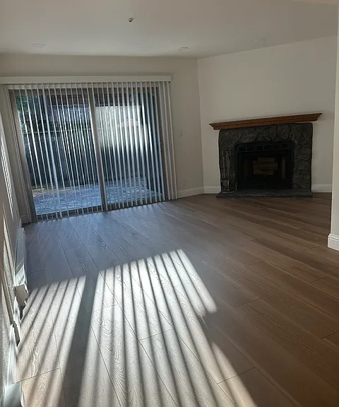 View from kitchen looking into living room and back patio