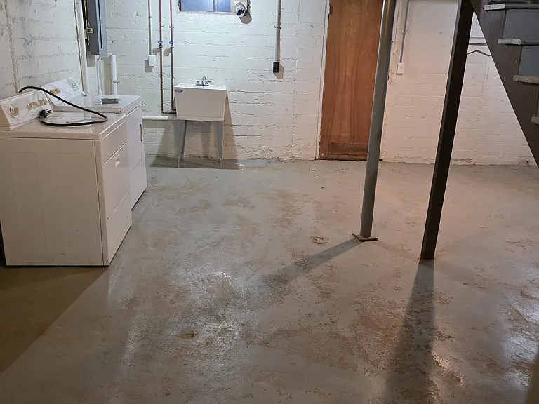 Open basement with tub sink