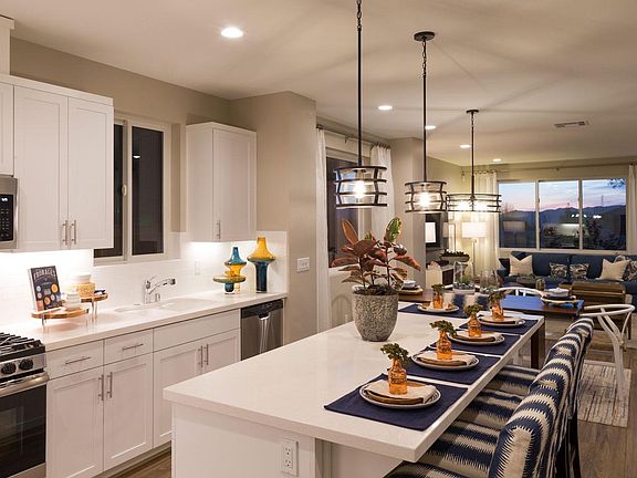 Kitchen of model home in same floor plan