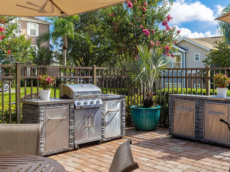 Fire up the grill and enjoy Florida sunshine at our outdoor kitchenperfect for weekend barbecues and poolside lunches.