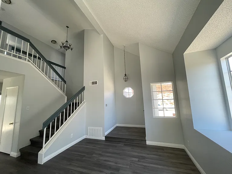 facing entry, stairs to 2nd story