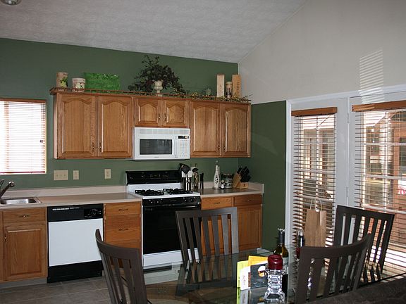 Kitchen open to Fam Room / Vaulted Ceiling