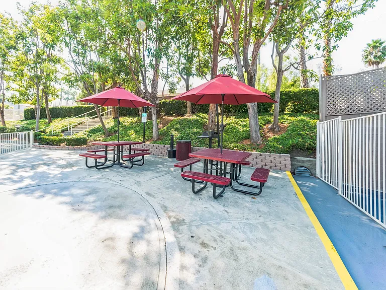 A BBQ and Picnic area at Meadow Creek Apartments in San Marcos, CA