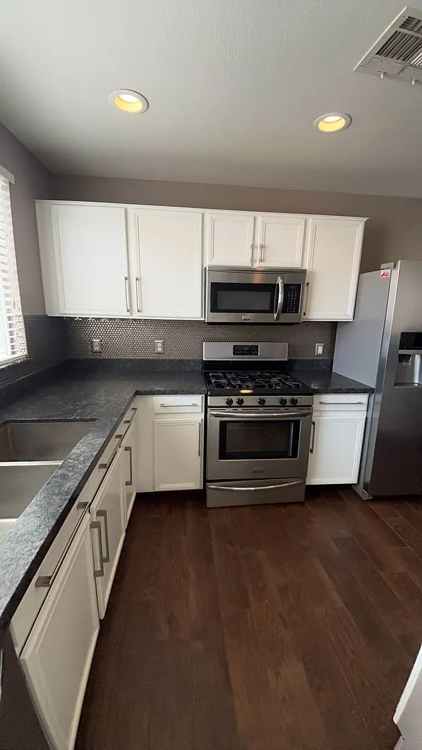 Building Photo - 9330 W Maule Ave #231