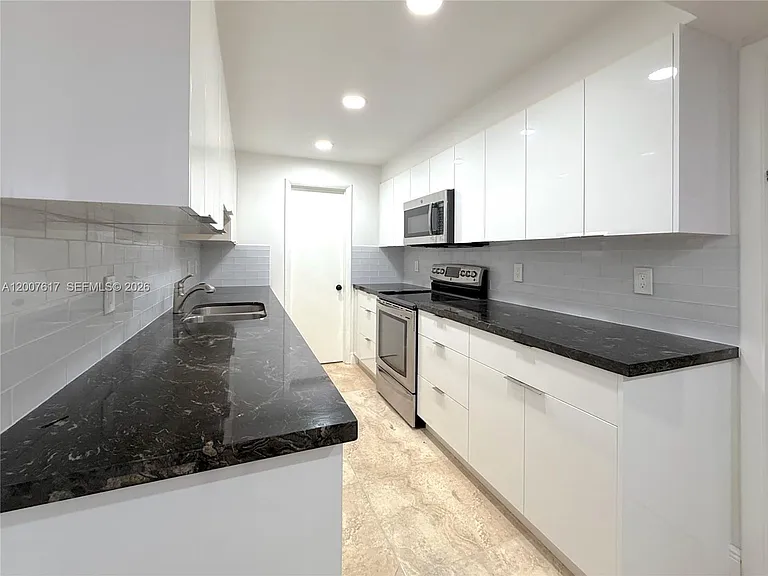 1075 92nd St #201 — Photo 3