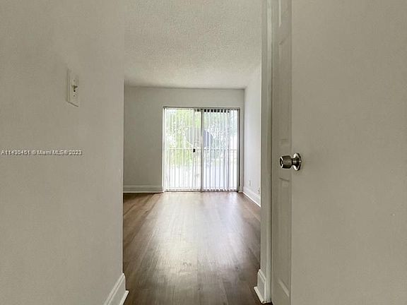5th image of 8600 N Sherman Cir APT 405