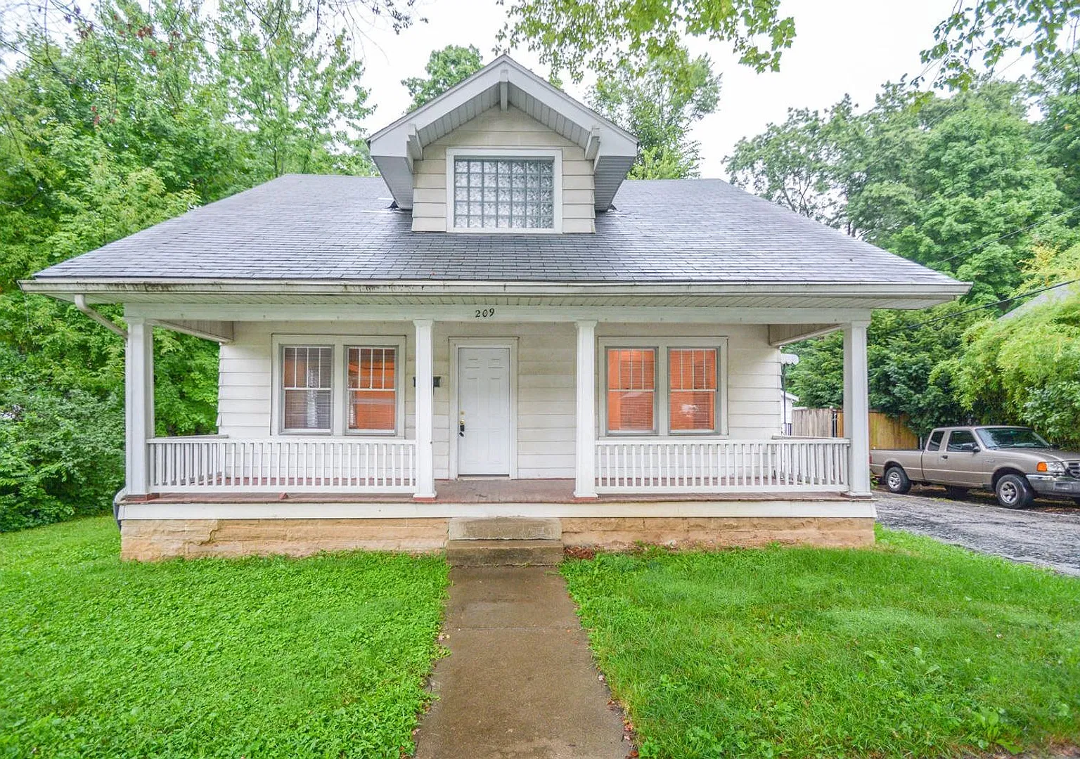 **August 2027** Updated Bathrooms, Garage & Outdoor Space!! 3 Bed, 2 Bath House!! — Photo 1