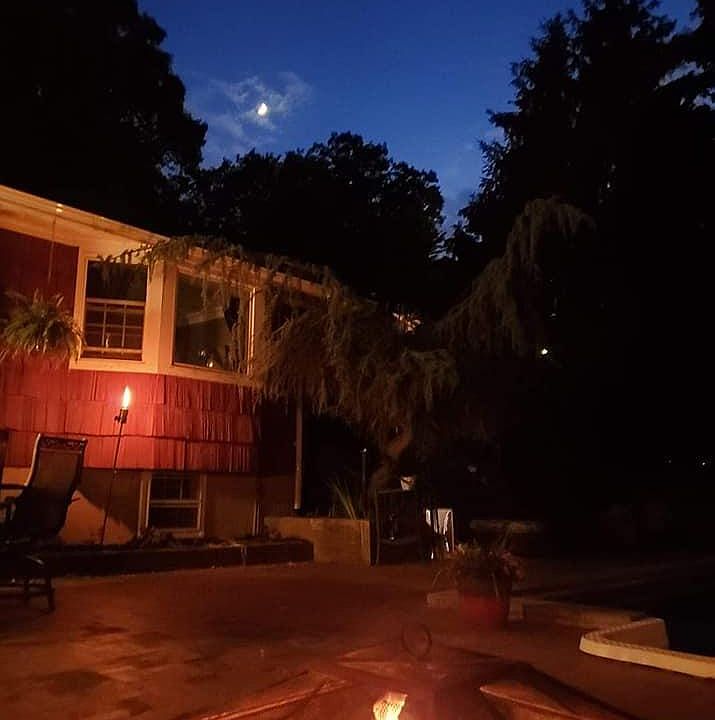 Private Entry in rear of house. Patio area looking at dusk looking at back of house.