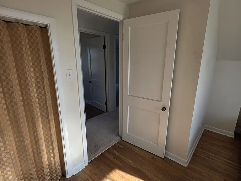 Upstairs Bedroom 2 - spacious closet as well as built-in cabinets for storage.