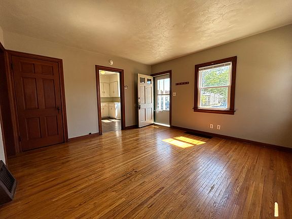Living Room, looking towards front door and kitchen