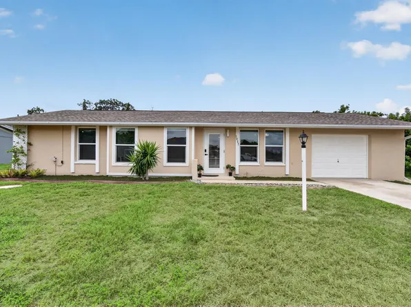 1057 Tropical Ave NW, Pt Charlotte, FL 33948