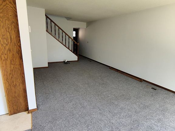 Living room off of the kitchen.