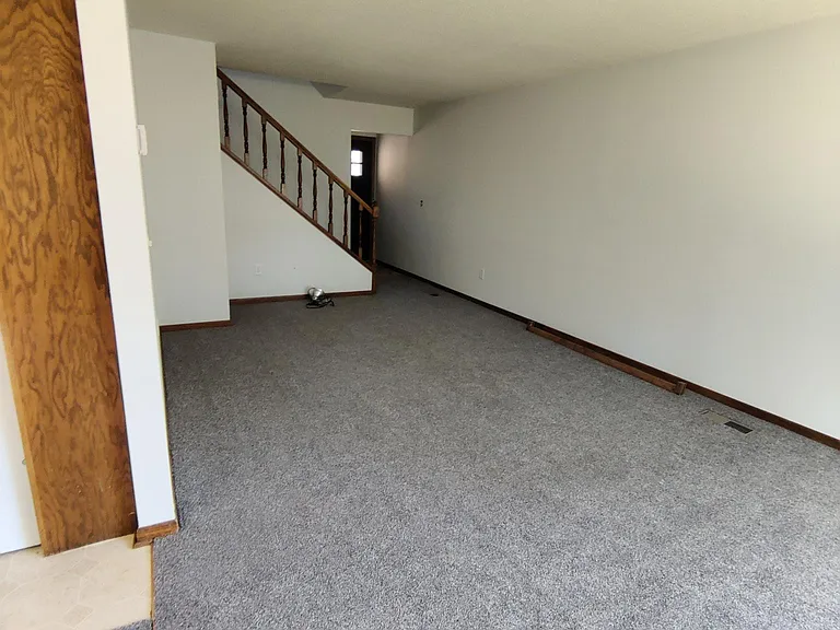 Living room off of the kitchen.