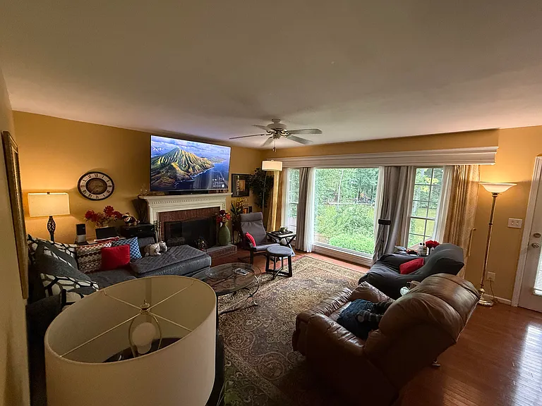 The living room is a great area, and we've got a 85 inch TV here to share! Great place to hang out.