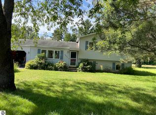7963 Lois Ave, Grawn, MI 49637