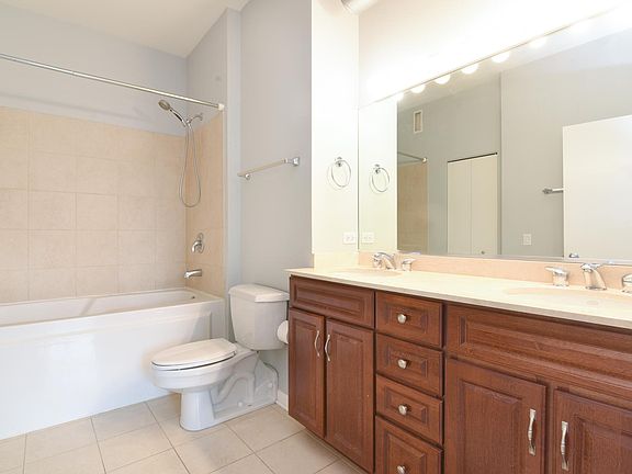 Double Sinks, soaking tub and plenty of drawers for your pro
