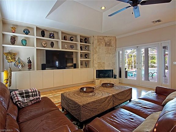 Built ins and French doors to screened lanai