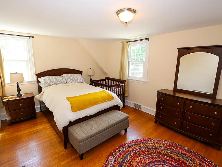 Main bedroom with two closets, hard-wood floors great natural light