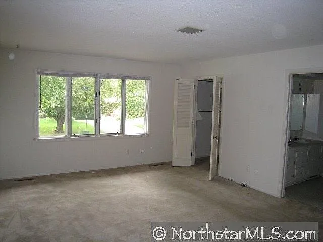 Master bedroom with attached batchroom and walkin closet