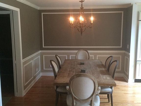 Dining Room w/ Crown Moulding and Chair Rail