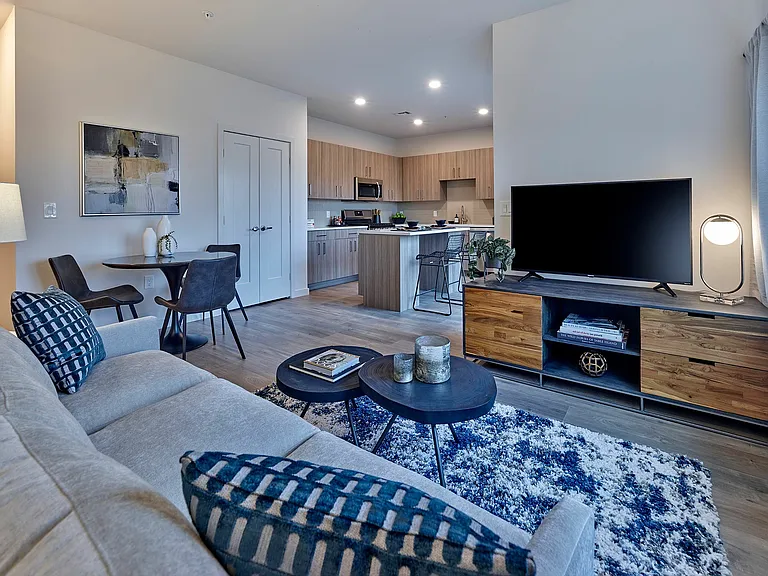 Experience the charm of this contemporary living space, blending comfort and modern design.
