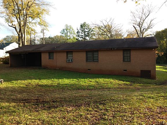 Rear entry carport garage
