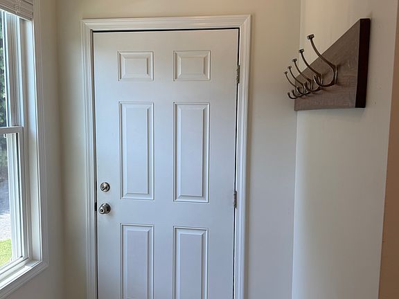 Mud room at rear entrance.