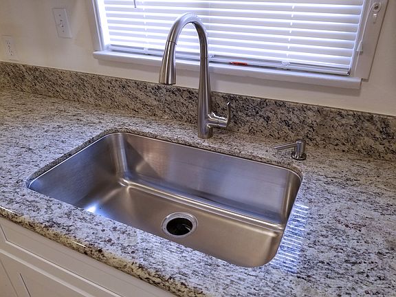 New stainless sink & faucet