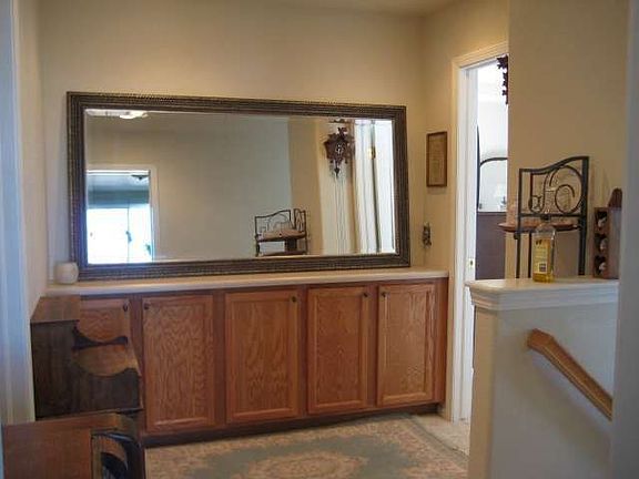 Upstairs hallway offers cabinets with plenty of storage!