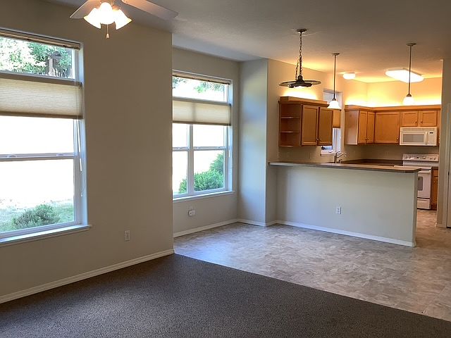 Large living/dining/kitchen area.