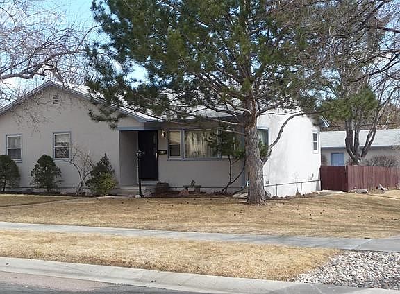 New roof-less than a year old. 2-car detached garage in back.