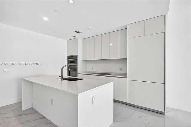 725 NE 24 — Photo 1