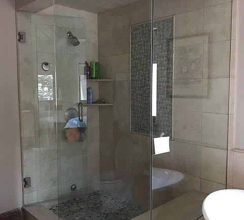 Upper level master bathroom with large soaking tub and steam shower