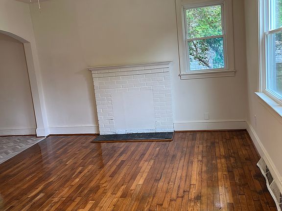 Living room; refinished hardwood floors, new ceiling fan