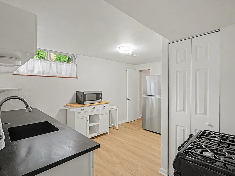 Lower level full kitchen with gas stove