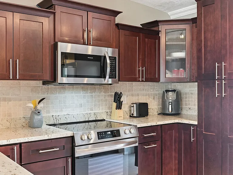 Brand new kitchen cabinets, counters and appliances with everything you could need to cook and entertain. Including Keurig, Toaster and Air Fryer,