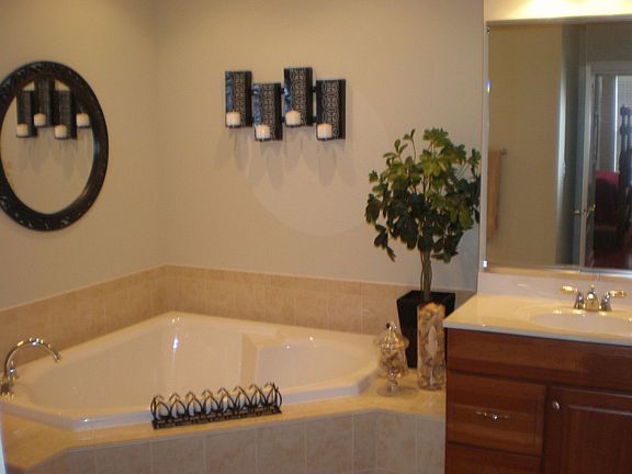 Calming, Master Spa/Bath with tile floors, dual vanities, garden tub, linen cl