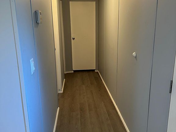 Hallway to 2 bedrooms and second bathroom