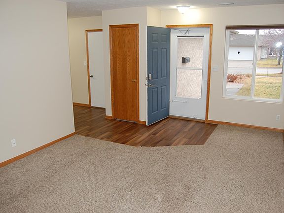 Another view of the living room, looking towards the front door.