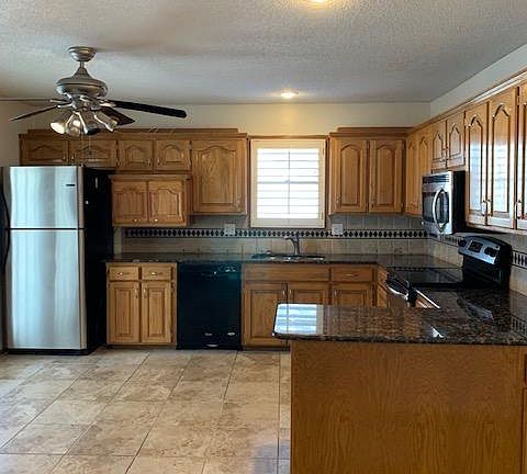 2nd image of 614 NE Fairington Ct