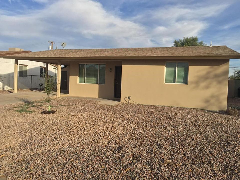 Exterior with new stucco and paint